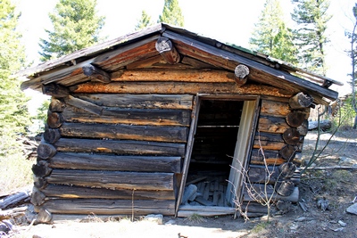 The only cabin I saw in Coloma (ghost town) Montana that has not yet collapsed.  There is also an old rusted barrel type wood stove inside.