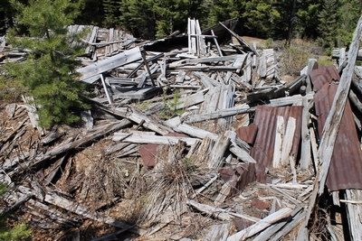 Completely collapsed structure (or is it 2 or 3 structures?) in the main part of Coloma (ghost town) Montana