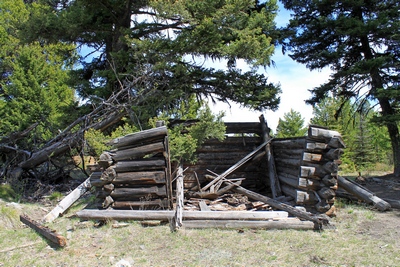 Second of several collapsed cabins seen upon entering Coloma (ghost town) Montana