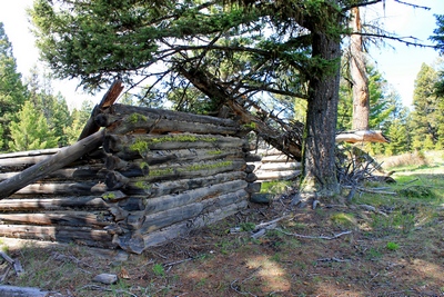 One of several collapsed cabins seen upon entering Coloma (ghost town) Montana