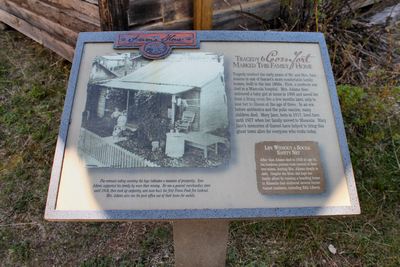 Sign in the front corner of the Adams house.  Tragedy and comfort marked this family home.  First, a newborn son died in a Missoula hospital.  Then, the family lost a girl at the age of 3.  A third child, Mary Jane, born in 1917 survived until 2011.