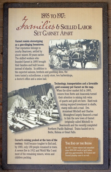 Families and skilled labor set Garnet apart from rowdy towns like Beartown between 1895 to 1917.  Garnet mining peaked at the turn of the century.  Sign seen at the parking lot to Garnet Ghost Town in the Garnet range of western Montana.