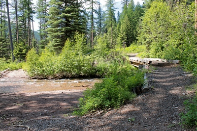 Monture Creek Trail (27) bridge crossing Falls Creek, which empties into Monture Creek further downstream.