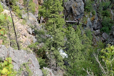 Obstructed view of the Falls Creek falls cascading down the mountain from above the 5000' elevation. Distances are greater than they appear.