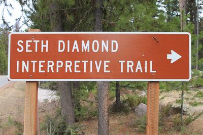 The Seth Diamond Interpretive Trail Trailhead about 1 mile north of the Seeley Lake Campground on Boyscout Road