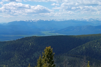 View from the top of Union Peak, Montana looking west to the Potomac Valley, and the Rattlesnake Mountains with McLeod Peak (8,620 ft.) in the distance.